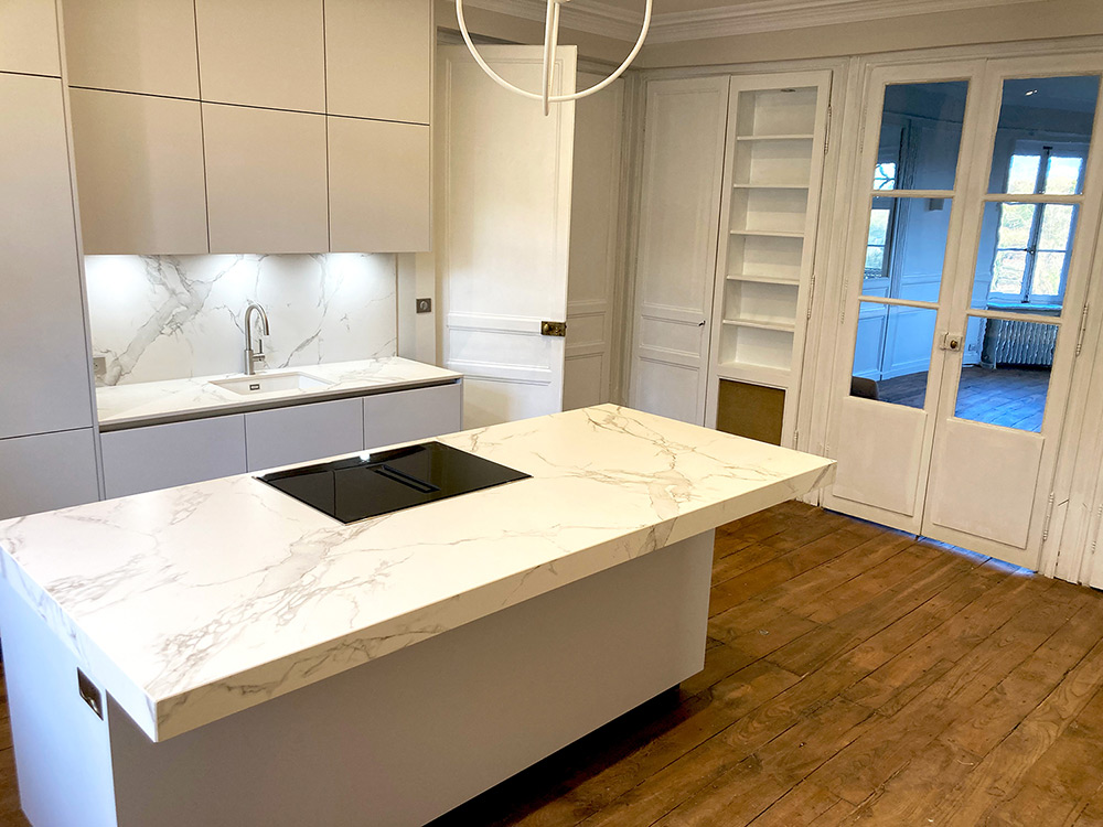 View of the kitchen looking onto the oval room.