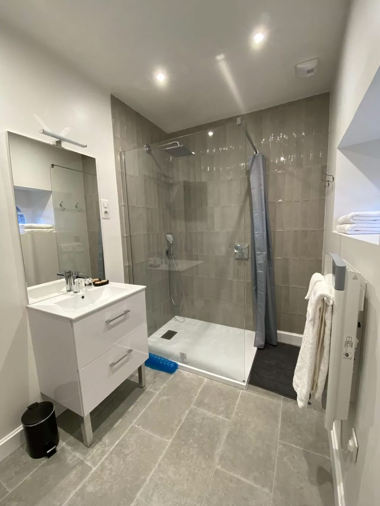 View of the ensuite with the shower room and the ensuite sink.