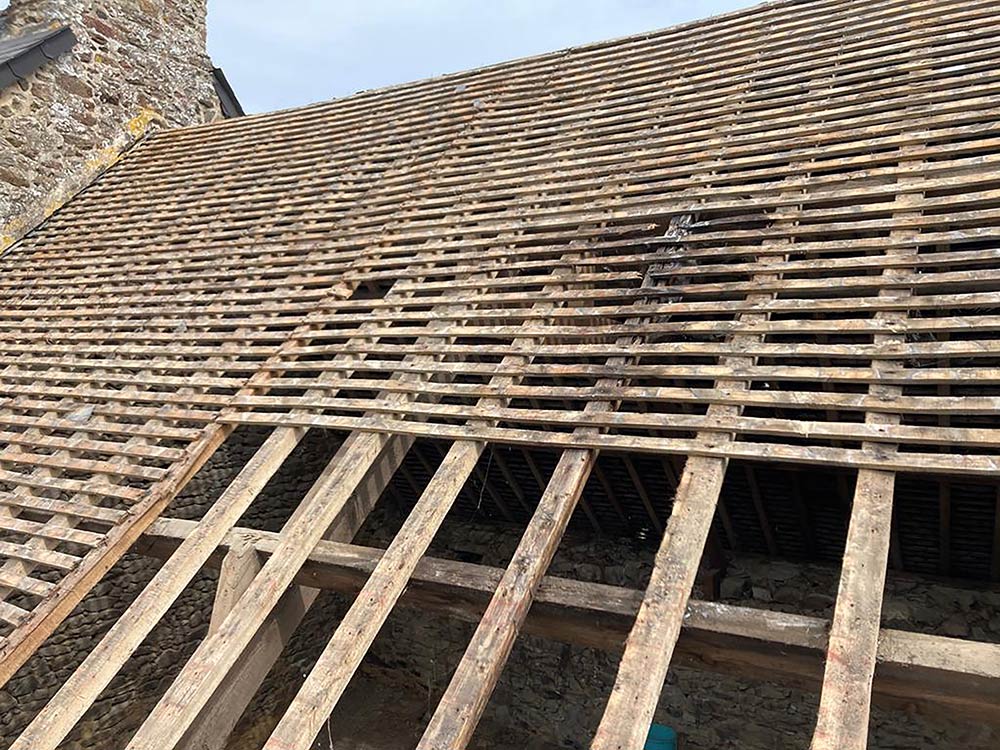 View of the wooden roof frame from the front of the property.
