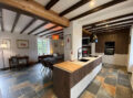View of the new kitchen showing the skin and the floor to ceiling unites.