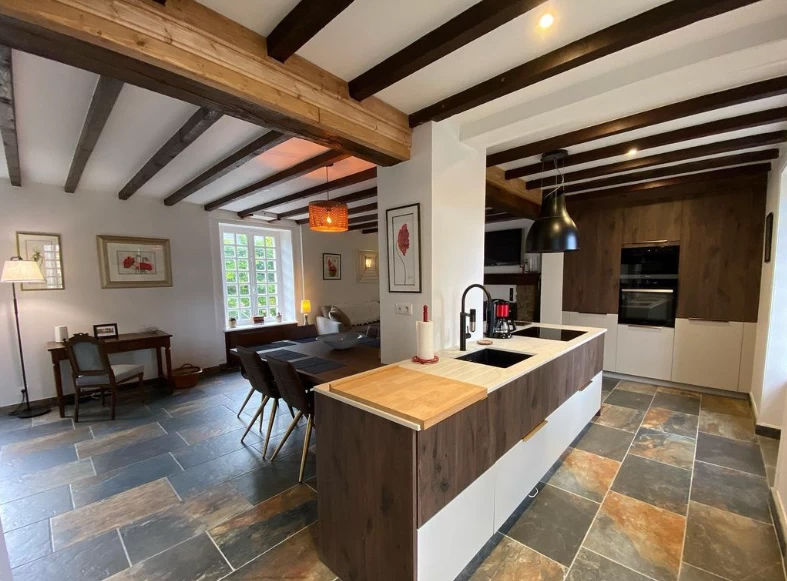 View of the new kitchen showing the skin and the floor to ceiling unites.