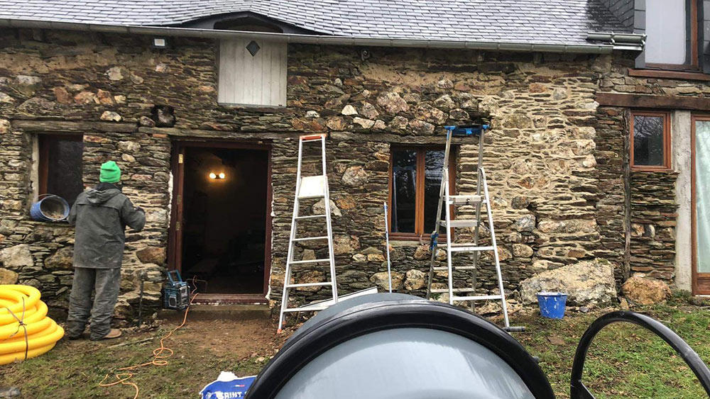 The stone work has been started on the façade